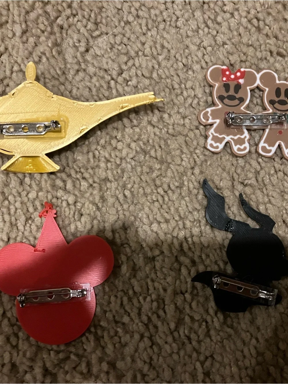 assorted 3D printed disney pins